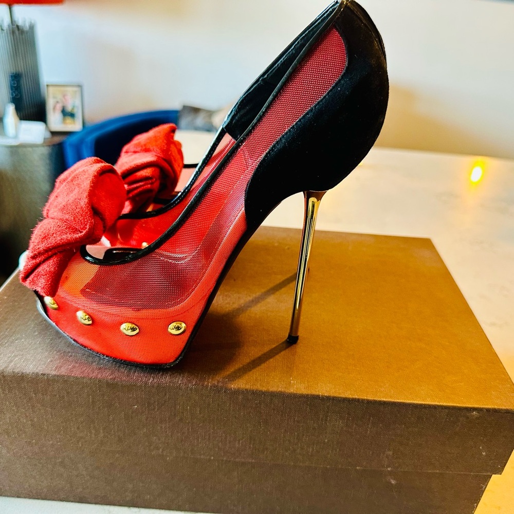 Chic Red and Black Heels with Gold Accents